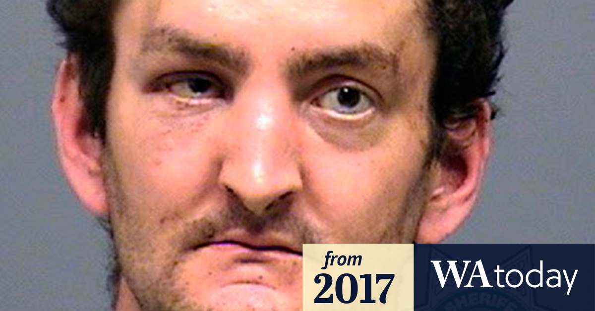 Video Police Man holding severed head stabbed clerk